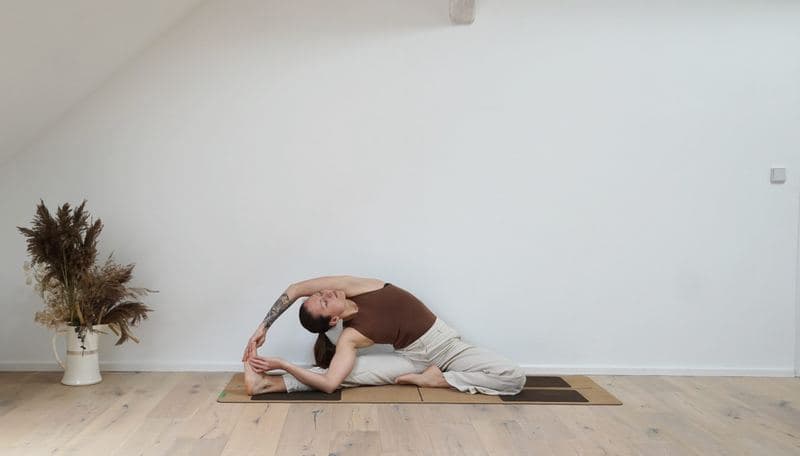 Revolved Head-to-Knee Pose